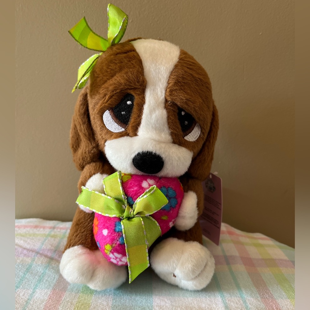 Brown and White Plush Dog with Pink Egg